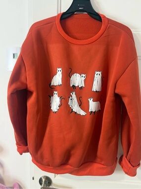 Orange Crewneck Sweatshirt with White Ghost Cats